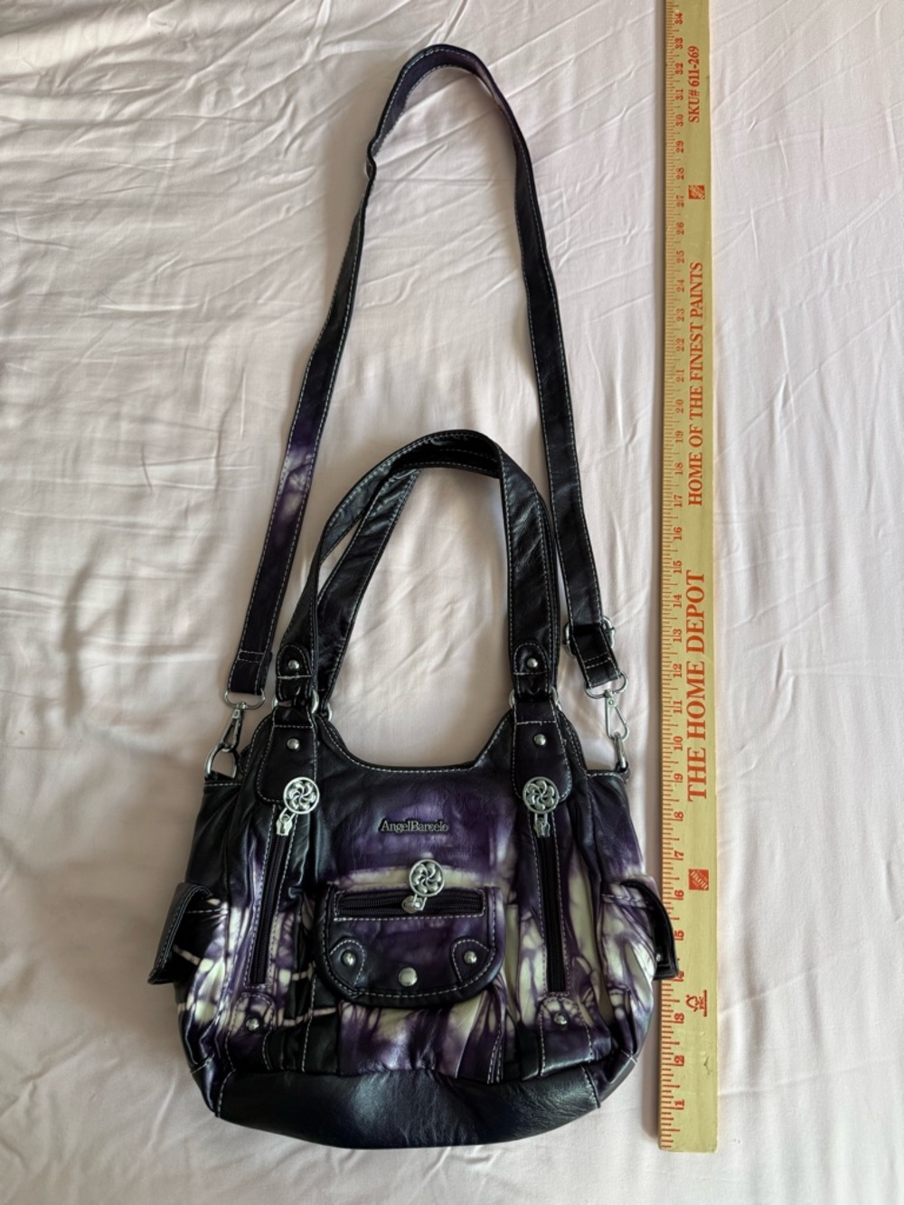 Purple tie-dye hobo purse with adjustable shoulder strap & pockets. PU leather.